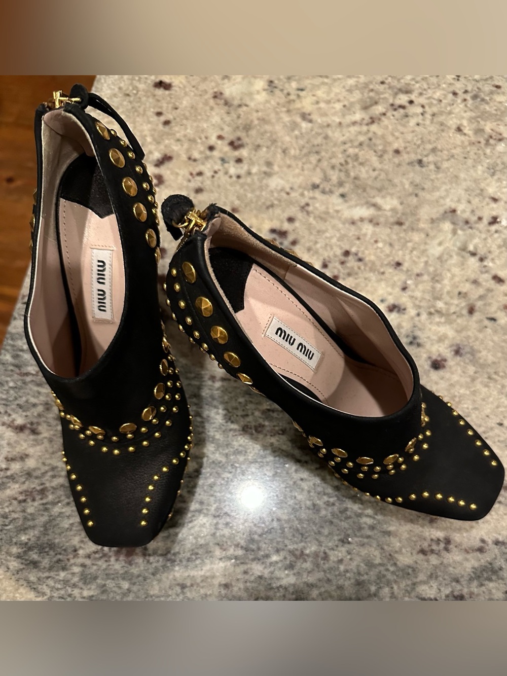 NWT; Miu Miu black leather studded pumps/slingback-style heels; size 37.